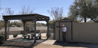 Patio and storage shed that has loaner golf clubs Patio and storage shed that has loaner golf clubs